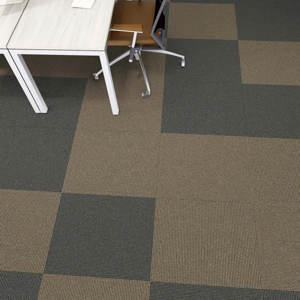 Beige and charcoal loose lay carpet tiles in office.