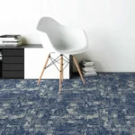 Blue distressed abstract pattern carpet tile in modern office