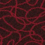 Red geometric pattern on dark carpet tile