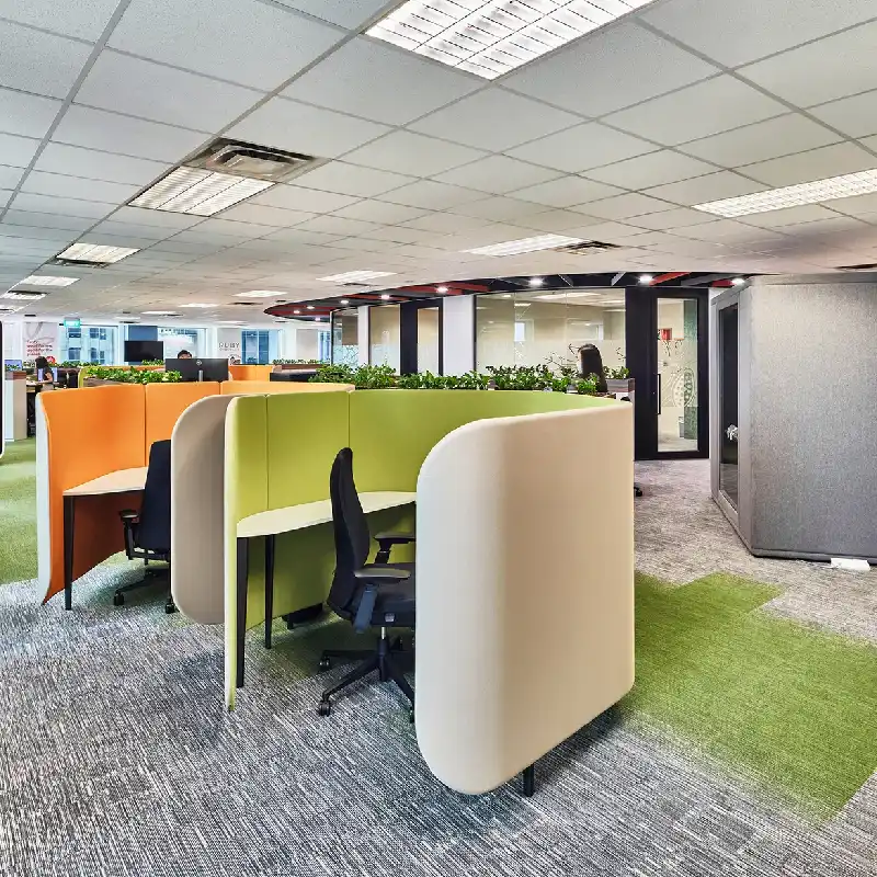 Modern linear carpet tiles in grey and lime for office pods.