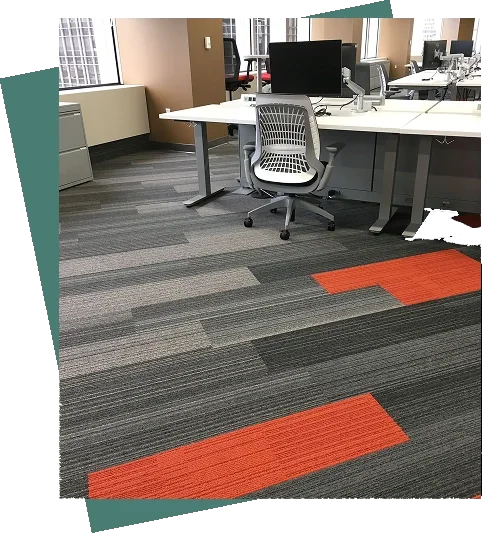 Modern linear grey and charcoal carpet tiles with orange accents. (1)