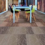Multi-toned gray modular carpet tiles in office