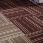 Striped carpet tiles in burgundy and beige tones