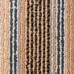 carpet tile with beige, navy, tan, and gray loop pile pattern