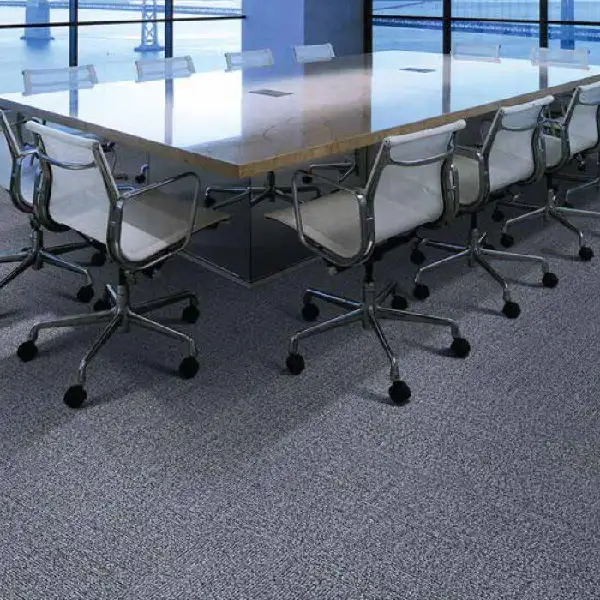 commercial carpet in conference room with white office chairs